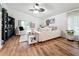 Spacious living room with a comfortable seating area and wood floors at 235 Lake Suzanne Dr, Lake Wales, FL 33859