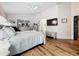 Large main bedroom with wood floors and plenty of light at 235 Lake Suzanne Dr, Lake Wales, FL 33859