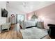 Spacious main bedroom with sliding door to patio at 235 Lake Suzanne Dr, Lake Wales, FL 33859