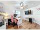 Bright home office with a desk, computer, and plenty of natural light at 235 Lake Suzanne Dr, Lake Wales, FL 33859
