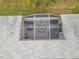 Aerial view of a screened porch with patio furniture at 235 Lake Suzanne Dr, Lake Wales, FL 33859