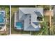 Bird's eye view of the property showing the house and pool at 357 Magneta Loop, Auburndale, FL 33823