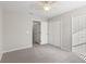 Simple bedroom with ceiling fan and carpet at 357 Magneta Loop, Auburndale, FL 33823