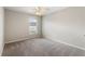 Simple bedroom with ceiling fan and carpet at 357 Magneta Loop, Auburndale, FL 33823