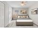 Bedroom with neutral walls and a queen-size bed at 357 Magneta Loop, Auburndale, FL 33823