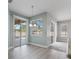 Dining room with light walls and access to the pool at 357 Magneta Loop, Auburndale, FL 33823