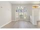 Dining room with bay window and hardwood-look floors at 357 Magneta Loop, Auburndale, FL 33823