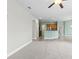 Open concept kitchen with island and stainless steel appliances at 357 Magneta Loop, Auburndale, FL 33823