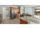Modern kitchen with stainless steel appliances and granite counters at 357 Magneta Loop, Auburndale, FL 33823