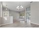 Open living room and dining area with access to the pool at 357 Magneta Loop, Auburndale, FL 33823