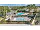 Community pool area with both lap and kiddie pools at 357 Magneta Loop, Auburndale, FL 33823