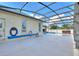 Spacious patio area with pool and hot tub at 357 Magneta Loop, Auburndale, FL 33823