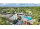 Community pool area with two pools and a cabana at 357 Magneta Loop, Auburndale, FL 33823
