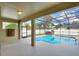 Screened pool and spa area with spacious patio at 357 Magneta Loop, Auburndale, FL 33823
