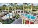 Community pool area with two pools and a clubhouse at 357 Magneta Loop, Auburndale, FL 33823
