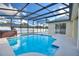 Inviting screened pool with spa and patio at 357 Magneta Loop, Auburndale, FL 33823