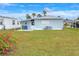 Private backyard with patio and spacious lawn at 6308 Bayberry Ne Blvd, Winter Haven, FL 33881