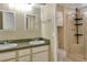Clean bathroom with a double vanity and a walk in shower at 6308 Bayberry Ne Blvd, Winter Haven, FL 33881