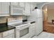 Modern kitchen with white appliances and ample counter space at 6308 Bayberry Ne Blvd, Winter Haven, FL 33881