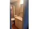 Main bathroom with a single sink vanity at 6447 Hollyberry Ne Ln, Winter Haven, FL 33881