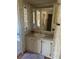 Bathroom with single sink vanity, and linen cabinet at 6447 Hollyberry Ne Ln, Winter Haven, FL 33881