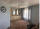Dining room with built-in hutch, light walls, and carpeted floor at 6447 Hollyberry Ne Ln, Winter Haven, FL 33881