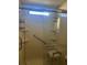 Walk-in shower with safety features at 6447 Hollyberry Ne Ln, Winter Haven, FL 33881