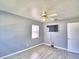 Spacious bedroom with tile floors and TV at 710 Highlands Ave, Dundee, FL 33838