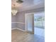 Dining room with access to screened porch at 710 Highlands Ave, Dundee, FL 33838