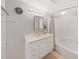 Clean bathroom with white vanity, shower/tub combo, and neutral decor at 1750 Fox Hill Dr, Lakeland, FL 33810