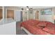 Spacious bedroom with mirrored closet doors and en-suite bathroom access at 1750 Fox Hill Dr, Lakeland, FL 33810
