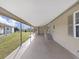 Covered patio with concrete flooring and access to home at 1750 Fox Hill Dr, Lakeland, FL 33810