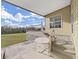 Wooden deck with lattice and railing overlooking backyard at 1750 Fox Hill Dr, Lakeland, FL 33810