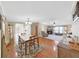 Bright dining room with hardwood floors and a view into the living room at 1750 Fox Hill Dr, Lakeland, FL 33810