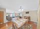 Open concept dining area with views to the living room and kitchen at 1750 Fox Hill Dr, Lakeland, FL 33810