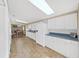 Open concept kitchen with white cabinets and blue countertops at 1750 Fox Hill Dr, Lakeland, FL 33810
