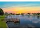 Serene lake view at sunset, a relaxing community amenity at 1750 Fox Hill Dr, Lakeland, FL 33810