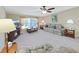 Relaxing living room with plush sofa, fireplace, and hardwood floors at 1750 Fox Hill Dr, Lakeland, FL 33810