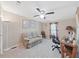 Home office with sofa, desk and ceiling fan at 1750 Fox Hill Dr, Lakeland, FL 33810
