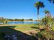 Peaceful lake view from the community at 418 Village Sw Cir, Winter Haven, FL 33880
