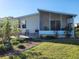 Well maintained home with a large screened porch at 418 Village Sw Cir, Winter Haven, FL 33880