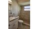 Bathroom with shower, toilet and vanity at 609 Estrada Ln, Kissimmee, FL 34758