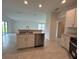 Modern kitchen with an island, stainless steel dishwasher and ample counter space at 1049 Bergamot Dr, Bartow, FL 33830