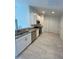Modern kitchen featuring stainless steel appliances and white cabinets at 2137 Emma Ln, Lake Wales, FL 33859