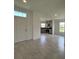Bright foyer with view of kitchen and tile floors at 1218 Navel Rd, Bartow, FL 33830