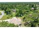 Home situated on a spacious lot with a long driveway at 213 Riverbend Rd, Ormond Beach, FL 32174