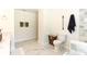 Bathroom with toilet and marble flooring at 213 Riverbend Rd, Ormond Beach, FL 32174