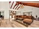 Spacious living room with high ceilings, wood floors, and a sectional sofa at 213 Riverbend Rd, Ormond Beach, FL 32174