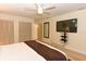 Main bedroom with king bed, large TV and ample closet space at 213 Riverbend Rd, Ormond Beach, FL 32174