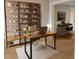 Home office with built-in shelving and modern desk at 210 W Illiana St, Orlando, FL 32806